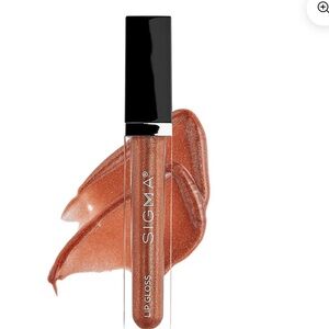Sigma Lip Gloss in Idyllic a tawny copper shimmer high shine, not sticky